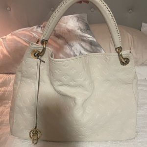 Louis Vuitton Artsy empreinte leather monogram bag
